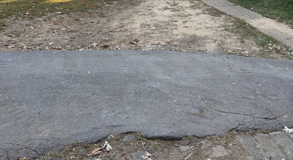 Before: a dirt drive off the paved road