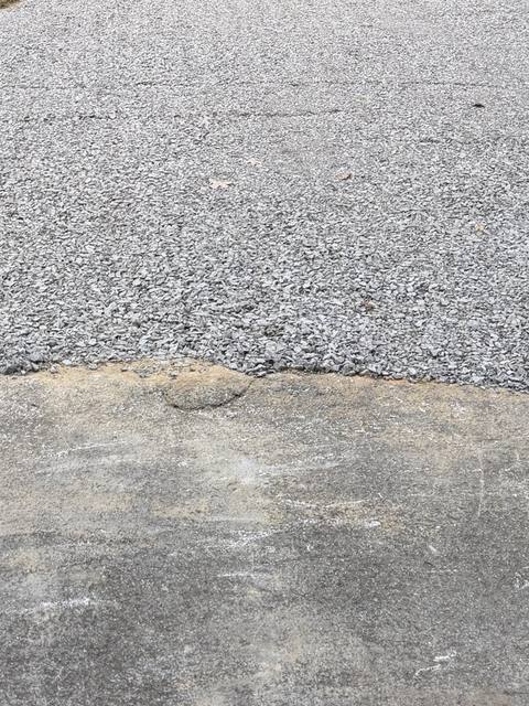 Driveway extended with fresh gravel