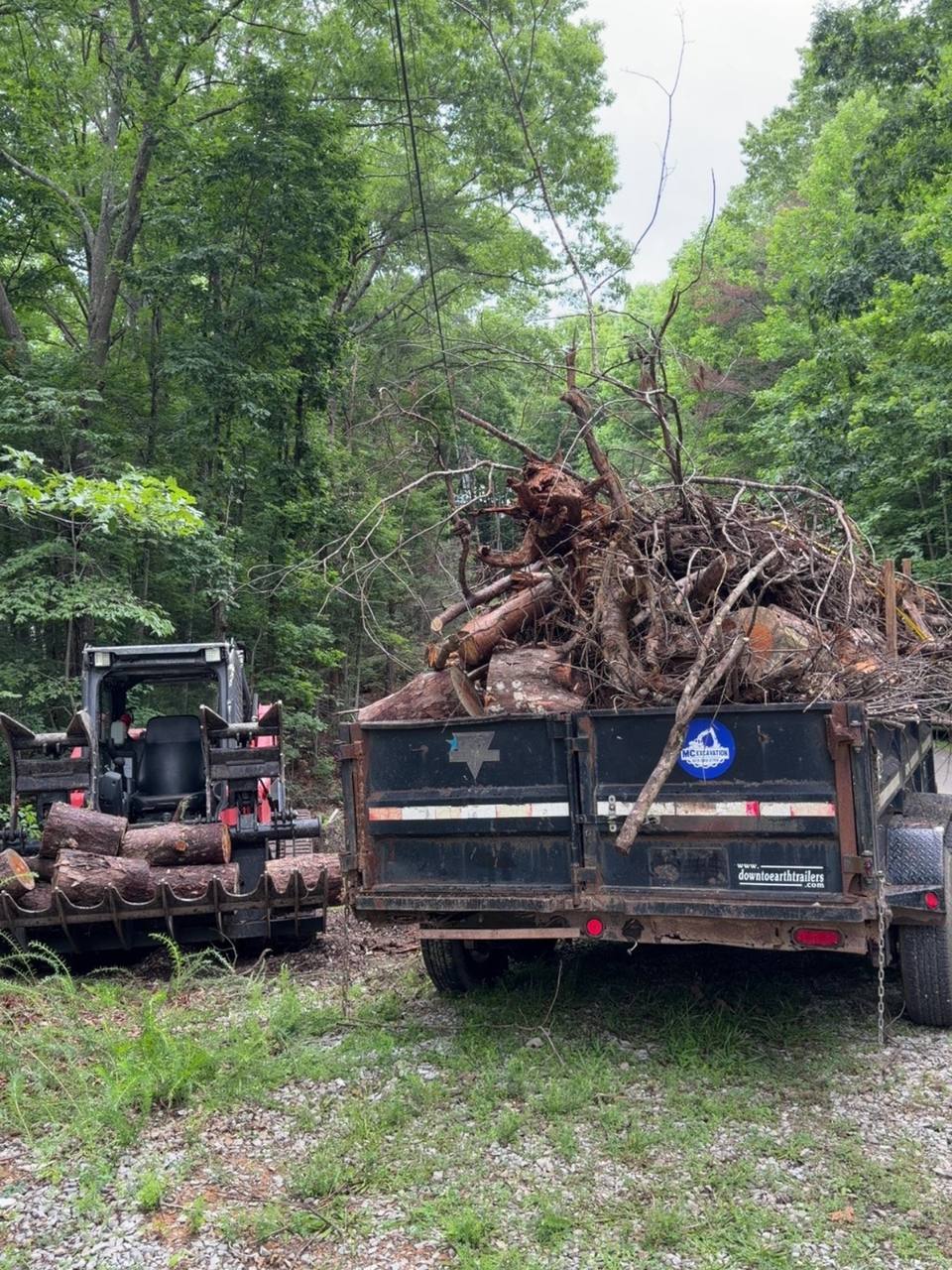 Truck and trailer hauling a load
