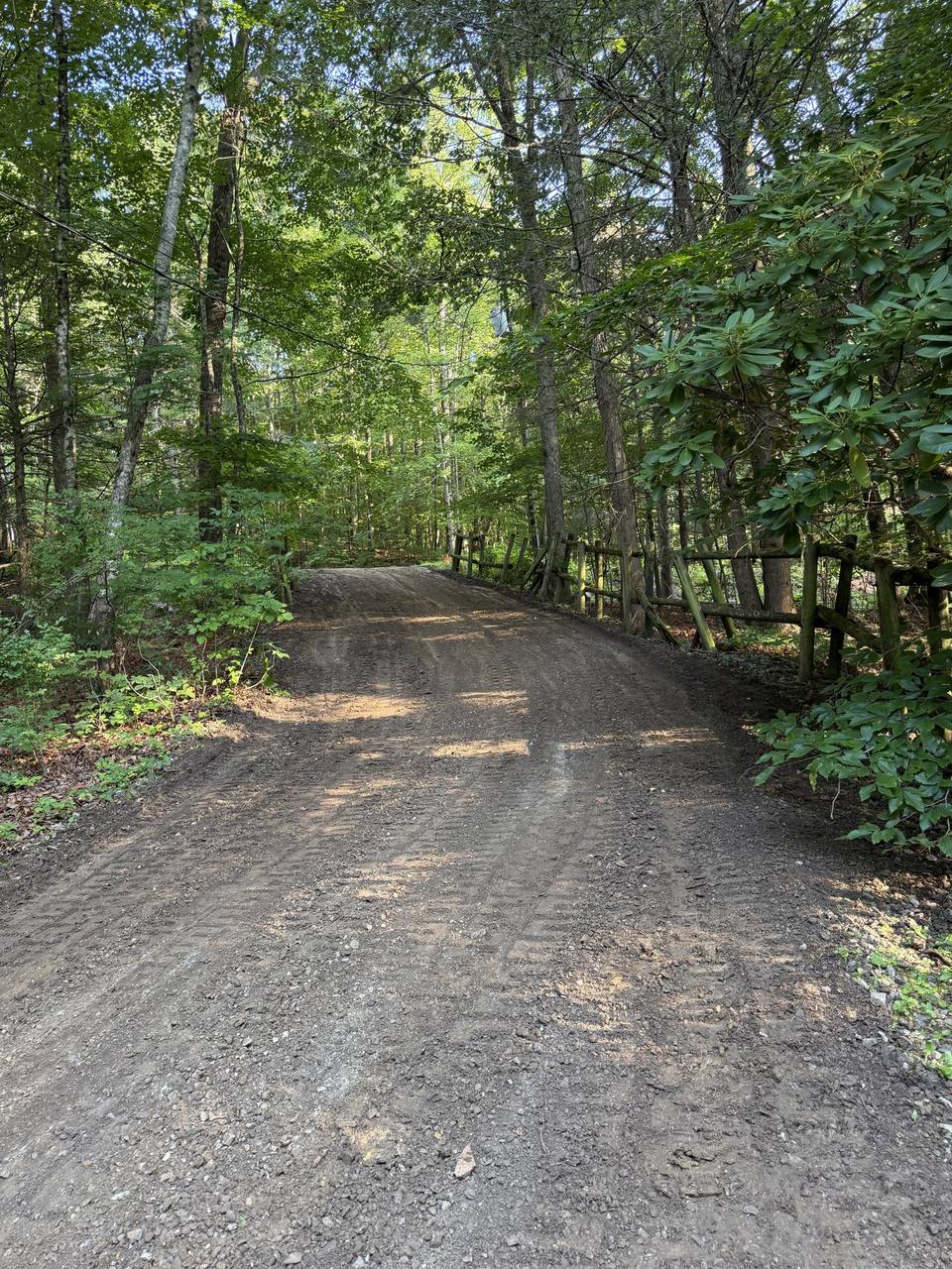 Before: the drive graded, ready for gravel
