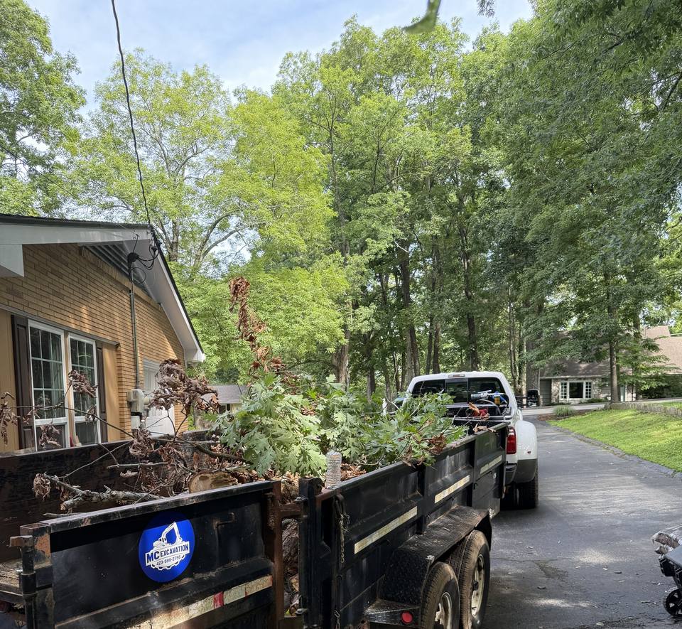 Loaded dump trailer hitched to a truck